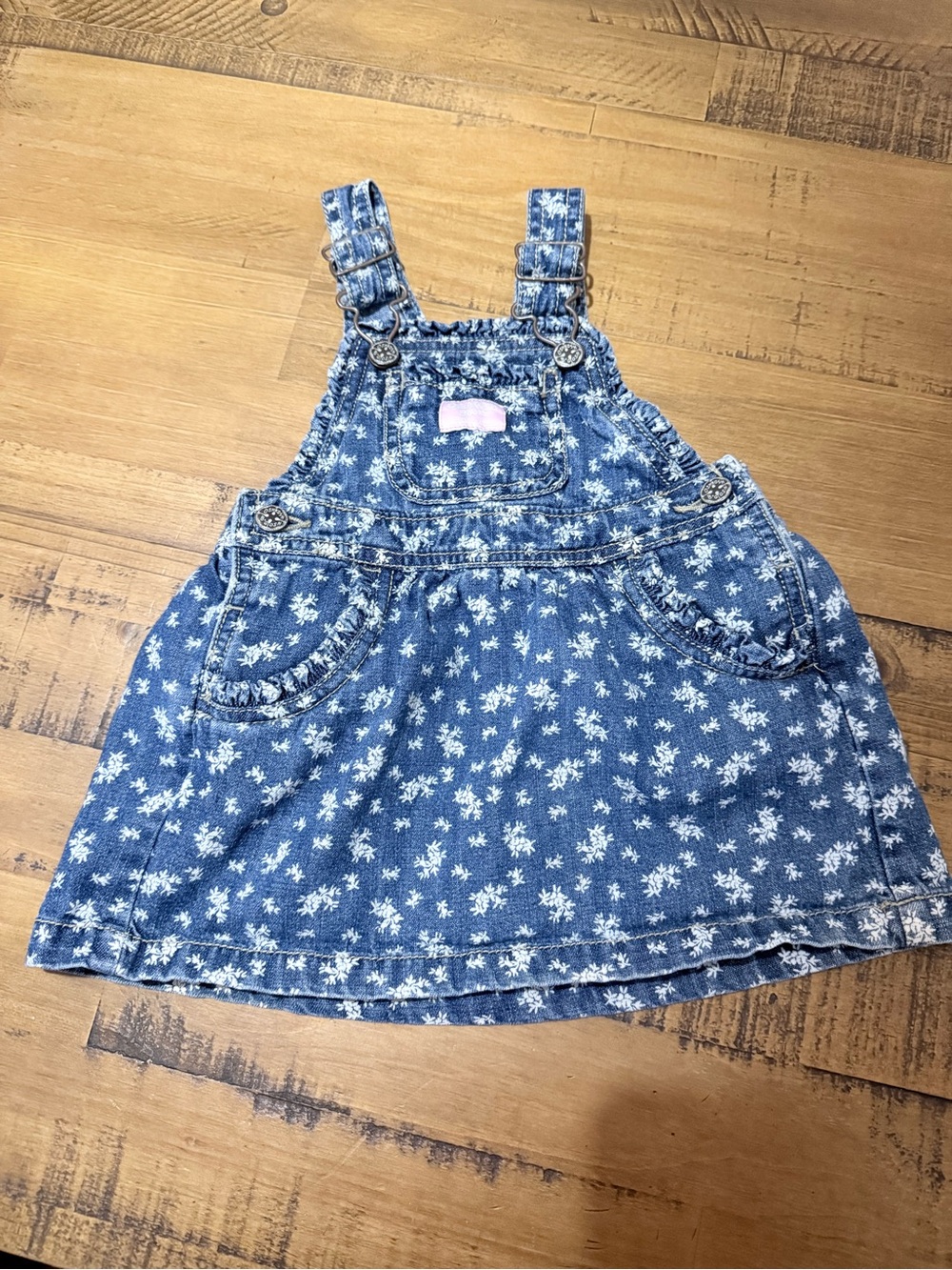 Vintage Y2K OshKosh B'gosh blue denim overalls with white floral print 24months
